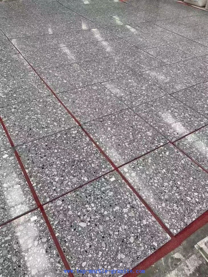 Terrazzo stone tiles lay out
